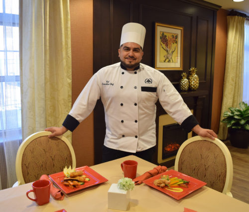 Executive Chef Sal Martinez showing off the finger food menu